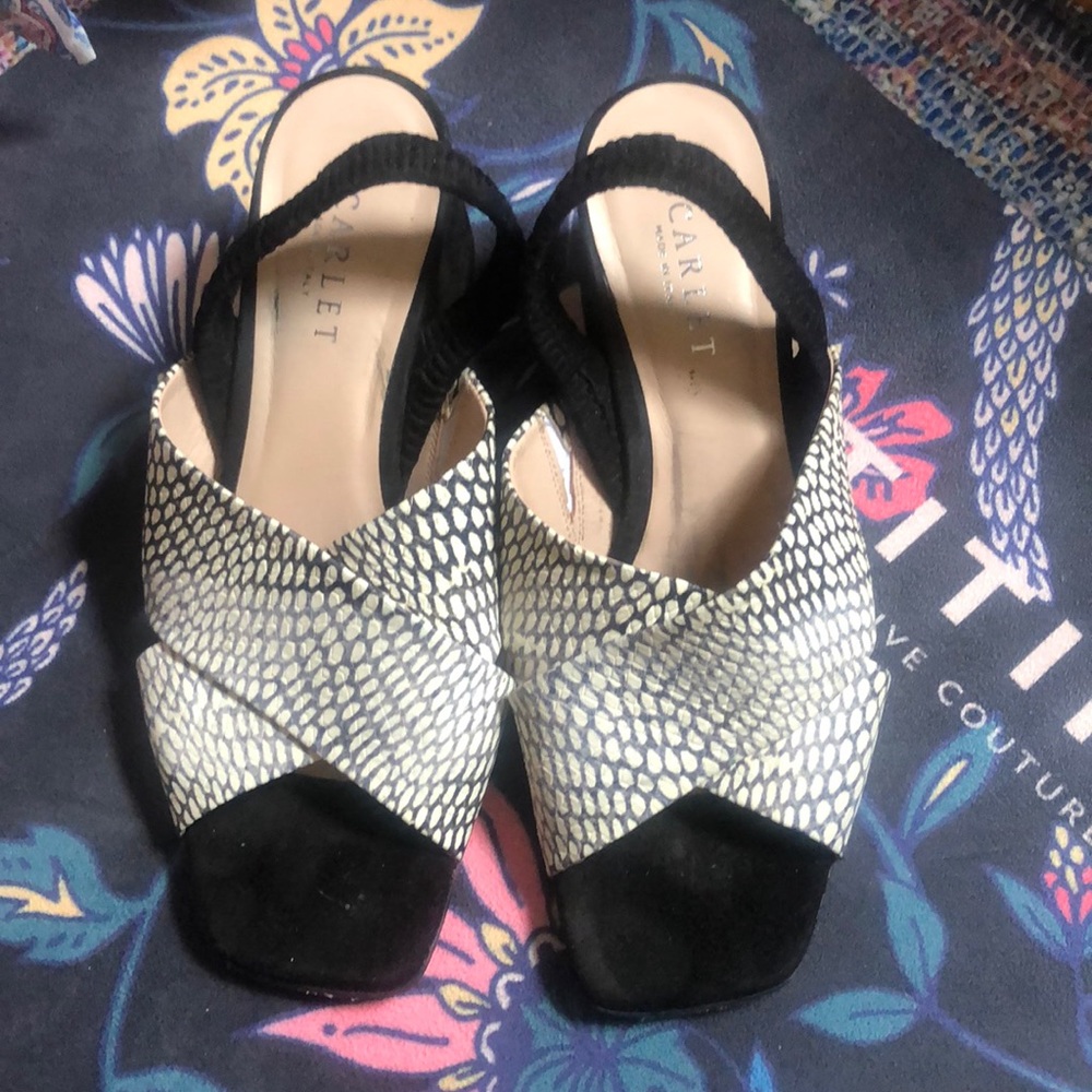 Black and cream sling-back sandals.